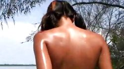 Stunning Latina with perfect small tits naked on beach